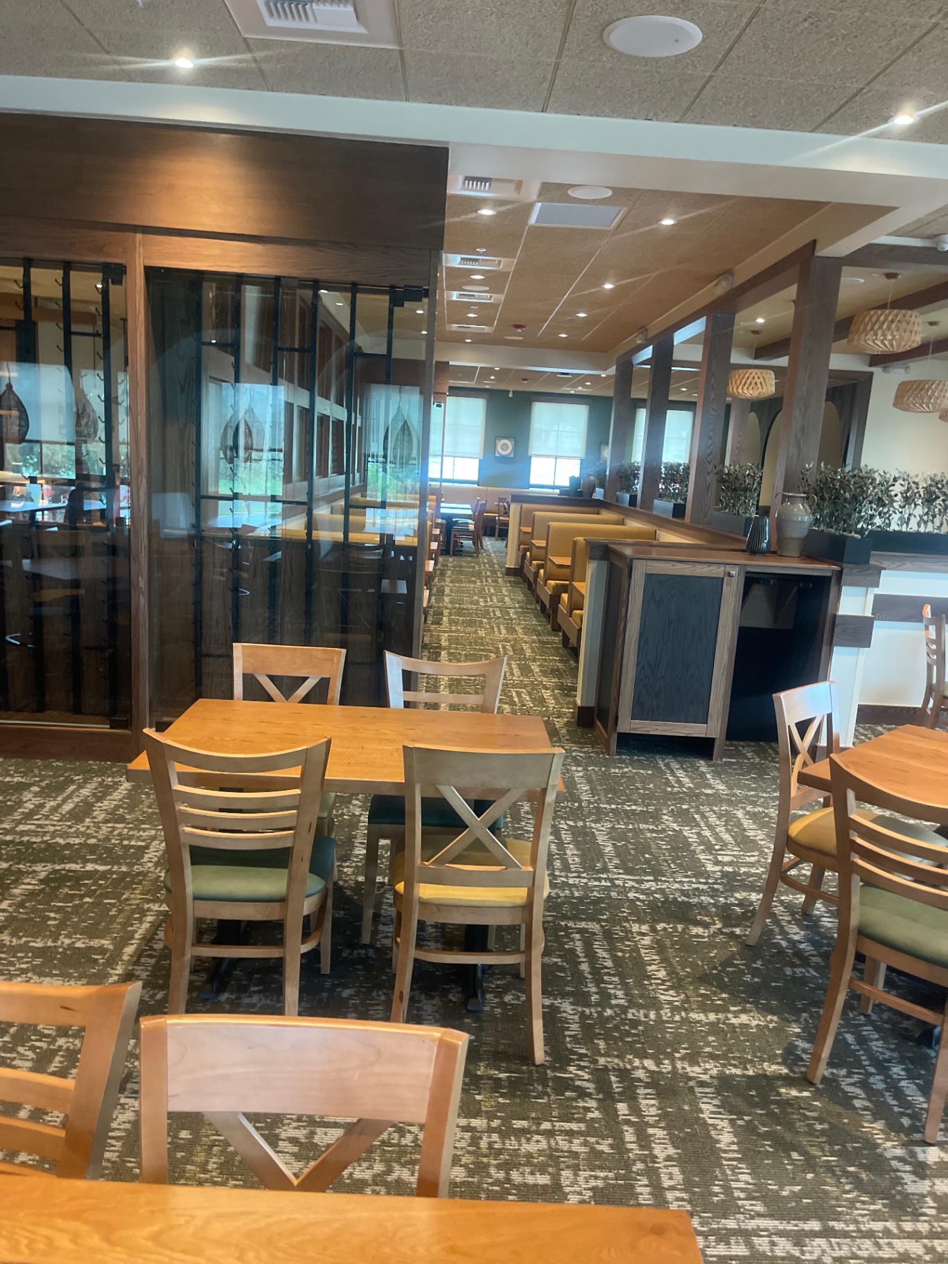 Cleaned restaurant dining room with tables, chairs and booth seating in Cedar Park, Texas