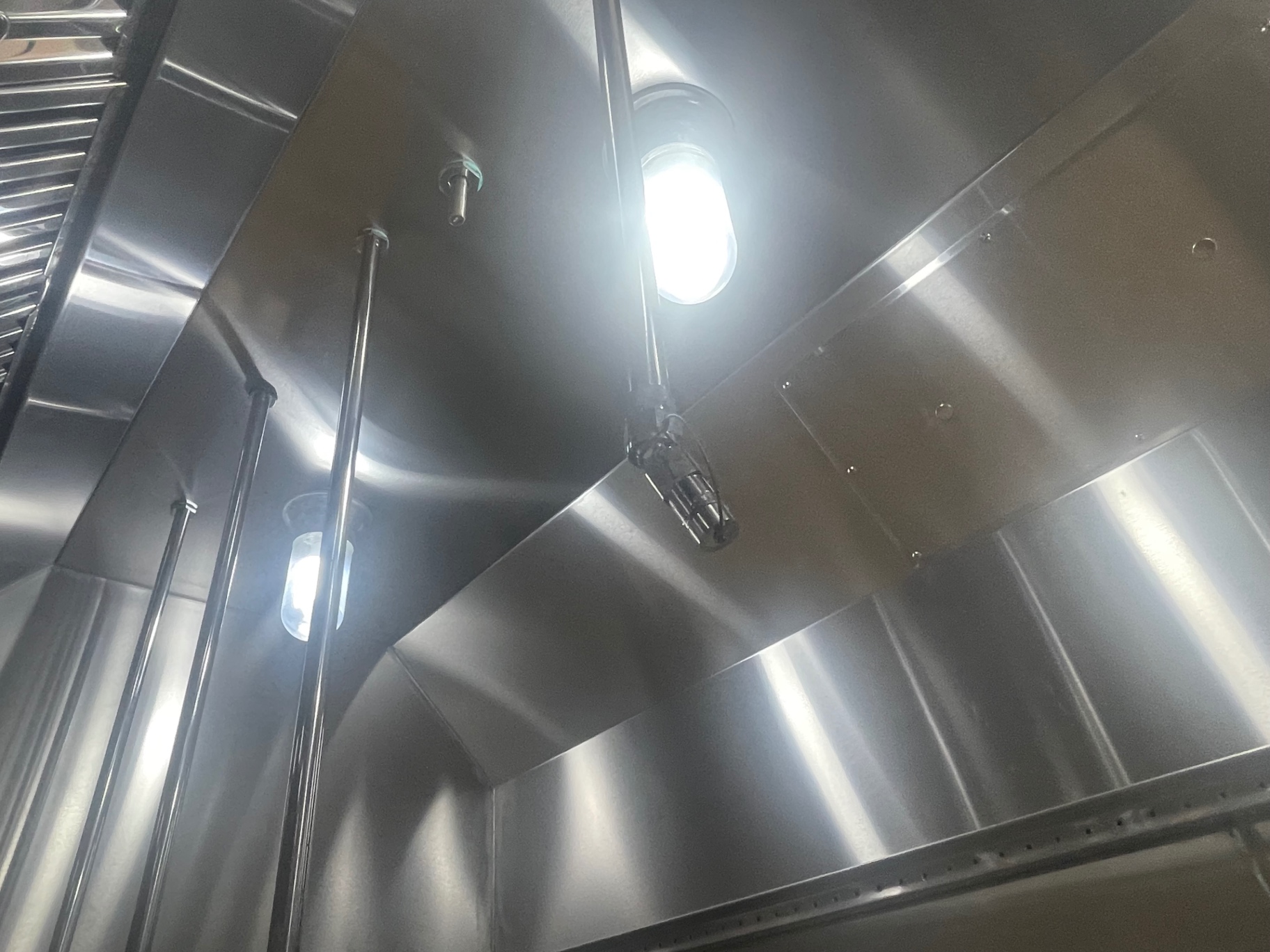Cleaned stainless hood plenum and wall panels