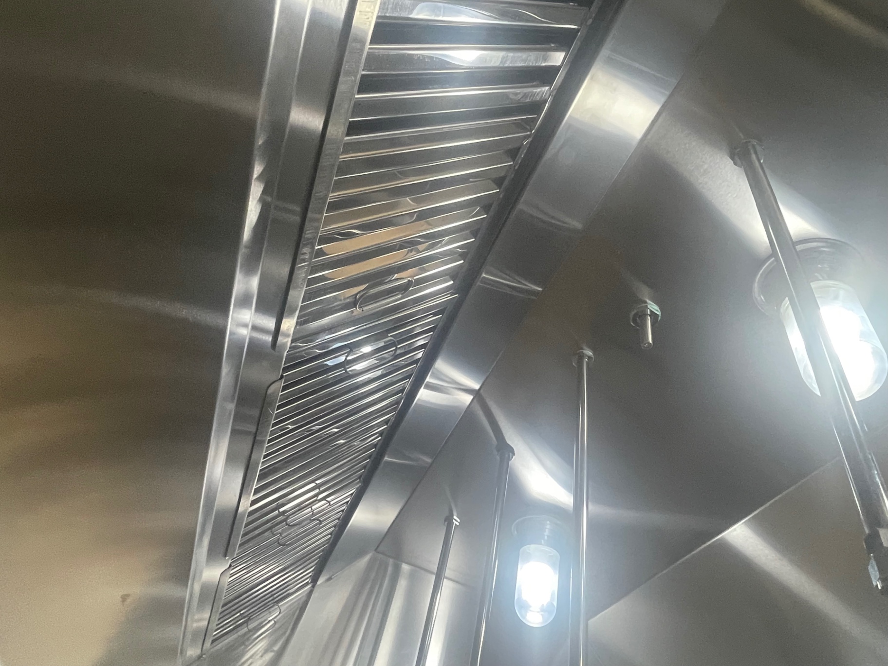 Exhaust hood filters and stainless canopy after cleaning