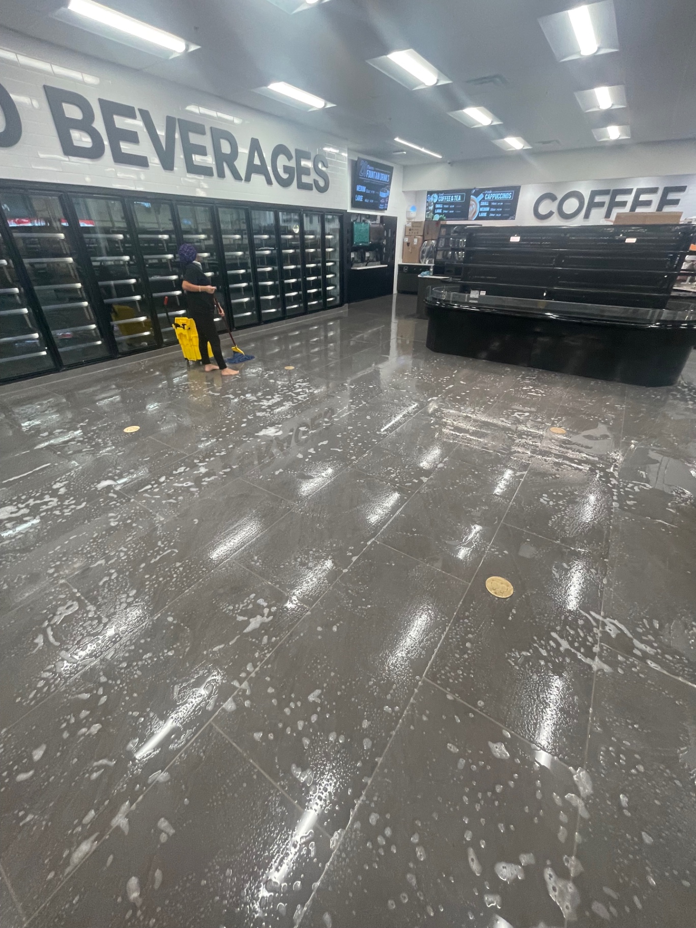 Retail beverage and coffee area with wet-scrubbed floor