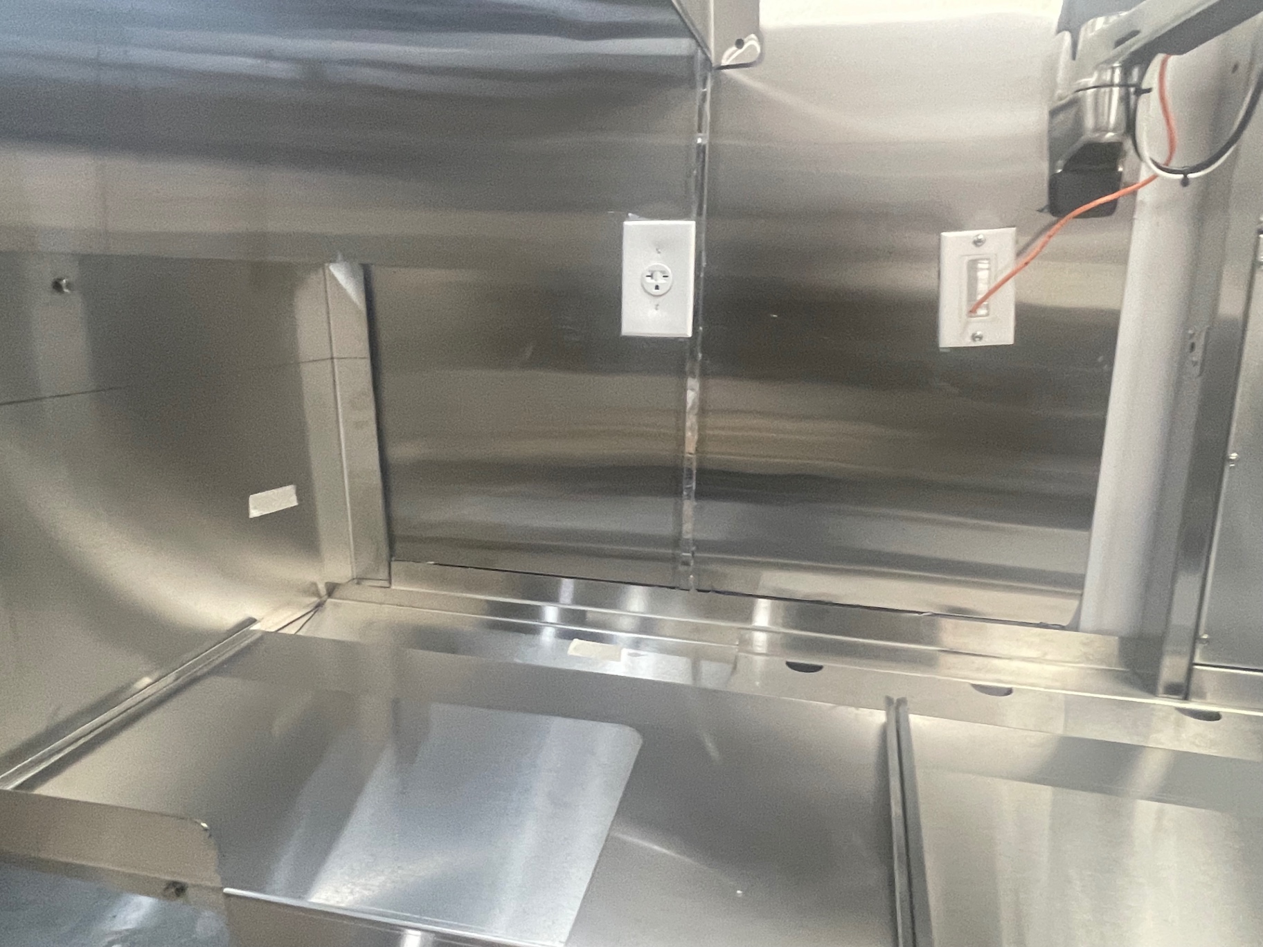 Interior of a cleaned stainless exhaust hood canopy